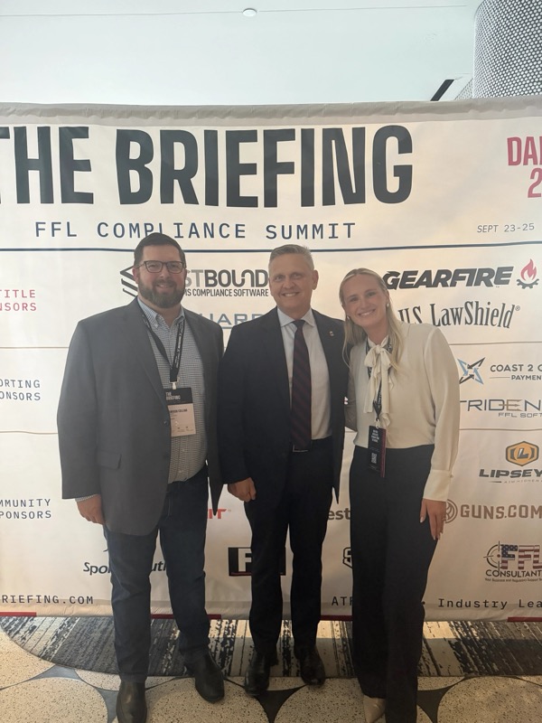 Jamison Collins, ATF Director Rob Cekada and Shae Neumann at The Briefing sponsor backdrop