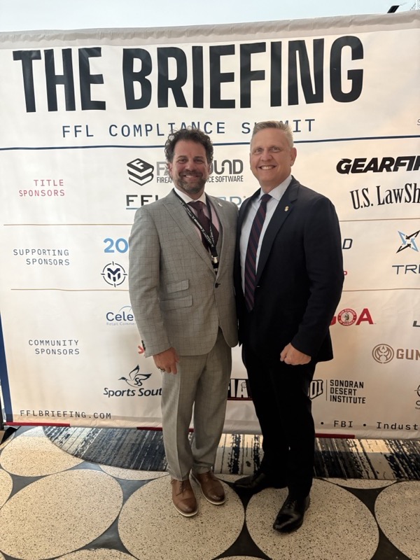 FFLGuard’s Chris Chiafullo and ATF Director Rob Cekada at The Briefing sponsor backdrop