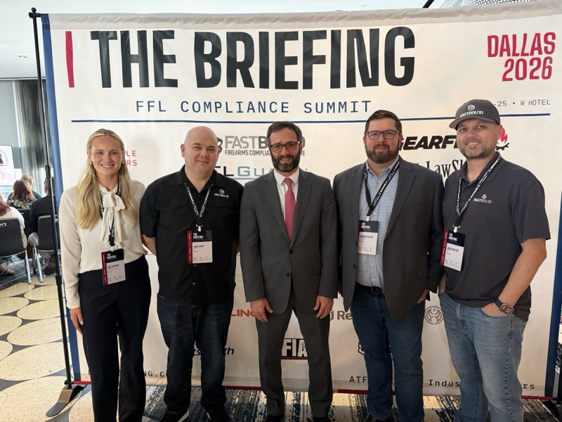 A group of five standing together at the event